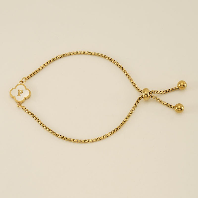 Pulsera con inicial y trébol