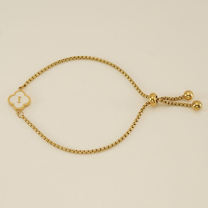 Pulsera con inicial y trébol