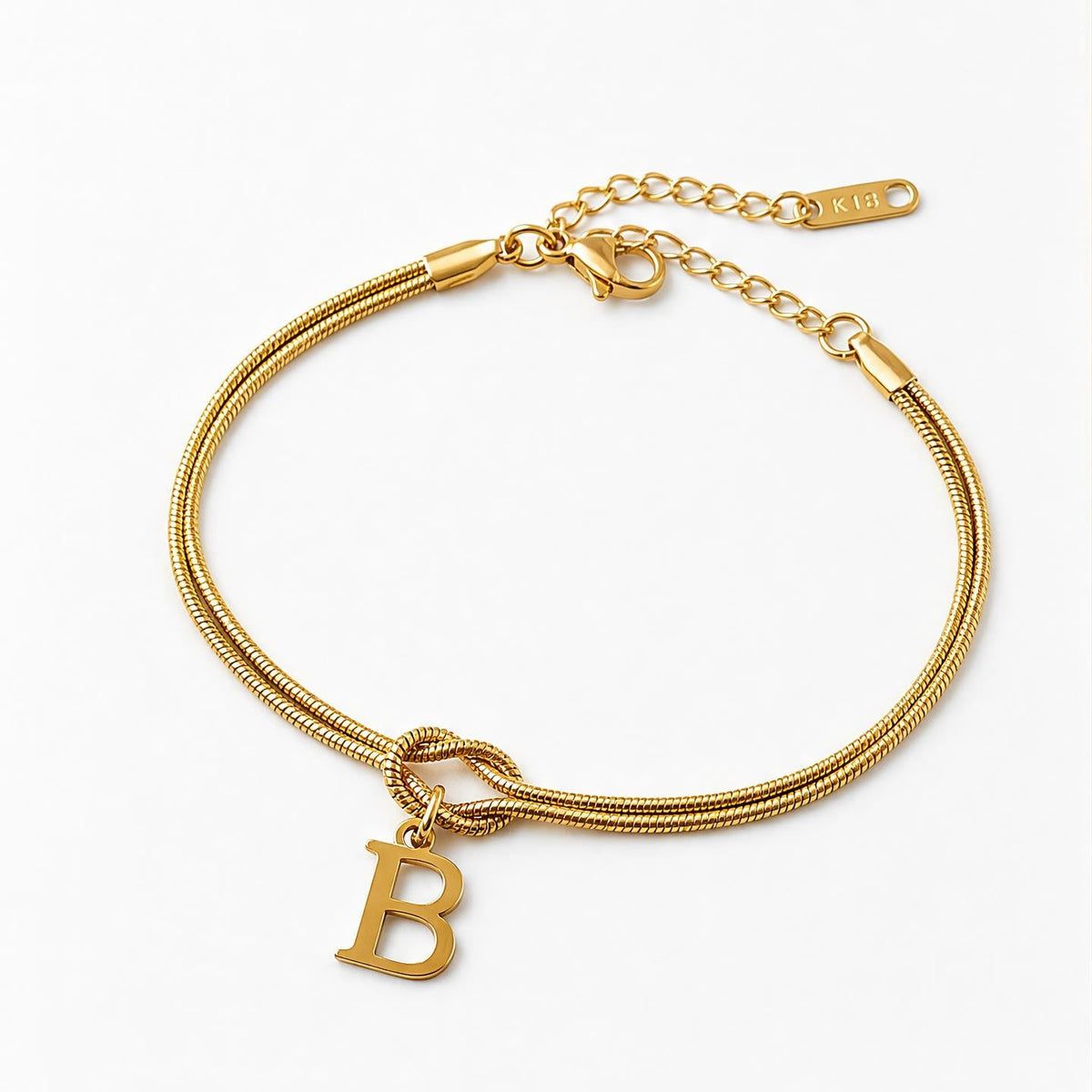 Pulsera personalizada con inicial y nudo infinito