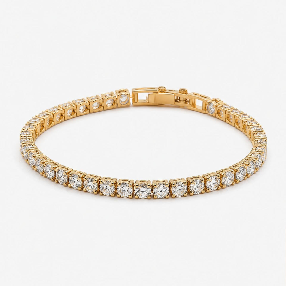 Pulsera de tenis chapada en oro con circonitas